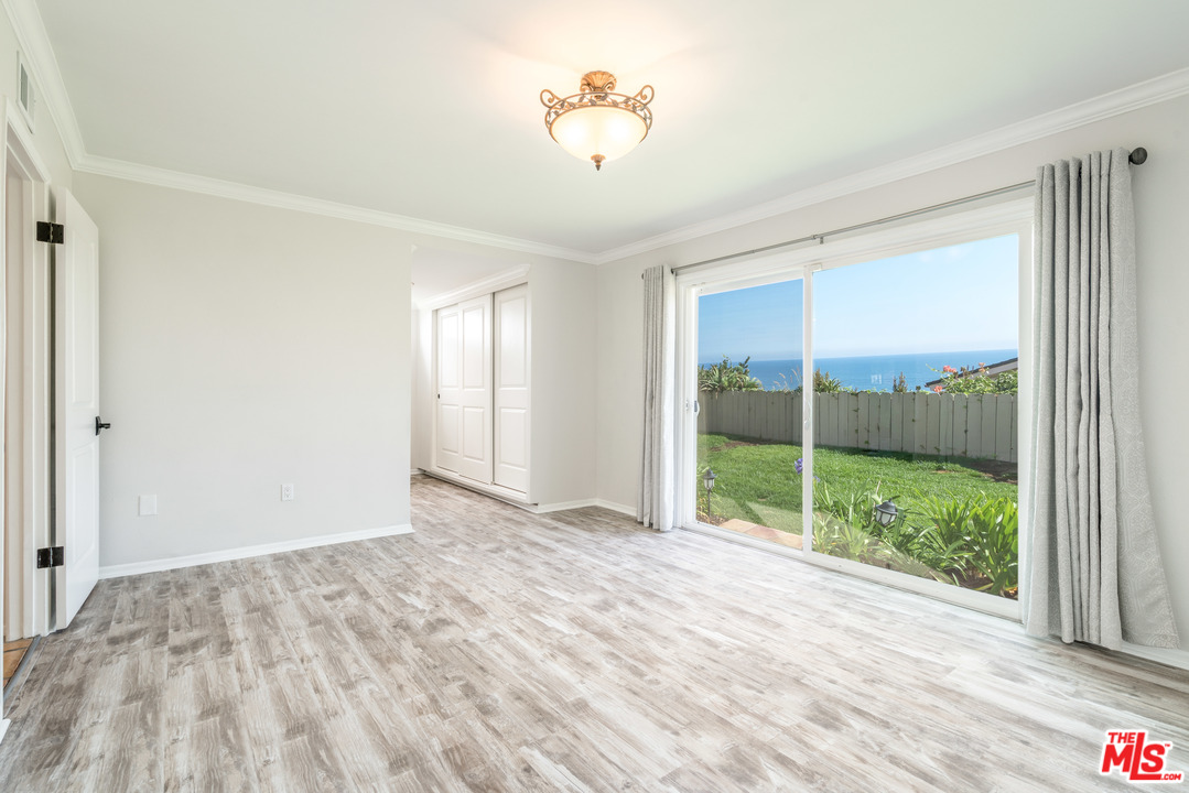 6267 Tapia Drive Malibu, CA 90265 - Photo 6 of 16 a view of an empty room with a window