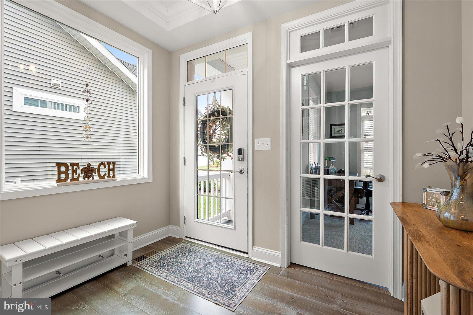 11271 Hall Road Lewes, DE 19958 - Photo 13 of 134 a view of livingroom with furniture and windows