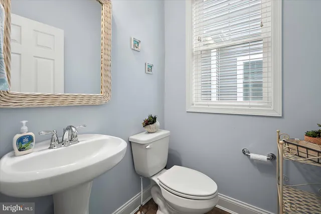 an aerial view of a house with a swimming pool yard and outdoor seating