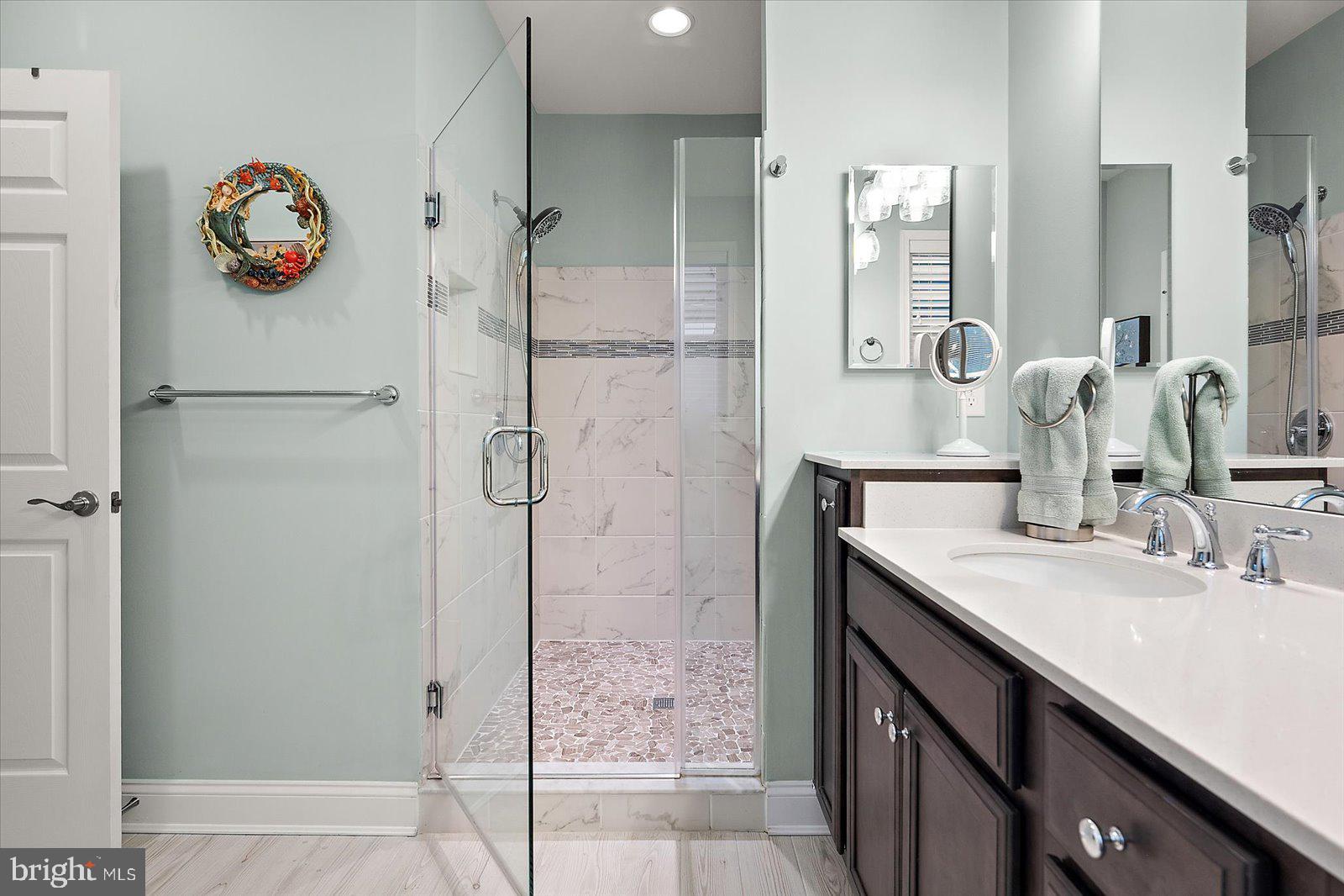 11271 Hall Road Lewes, DE 19958 - Photo 62 of 134 a bathroom with a sink and a mirror