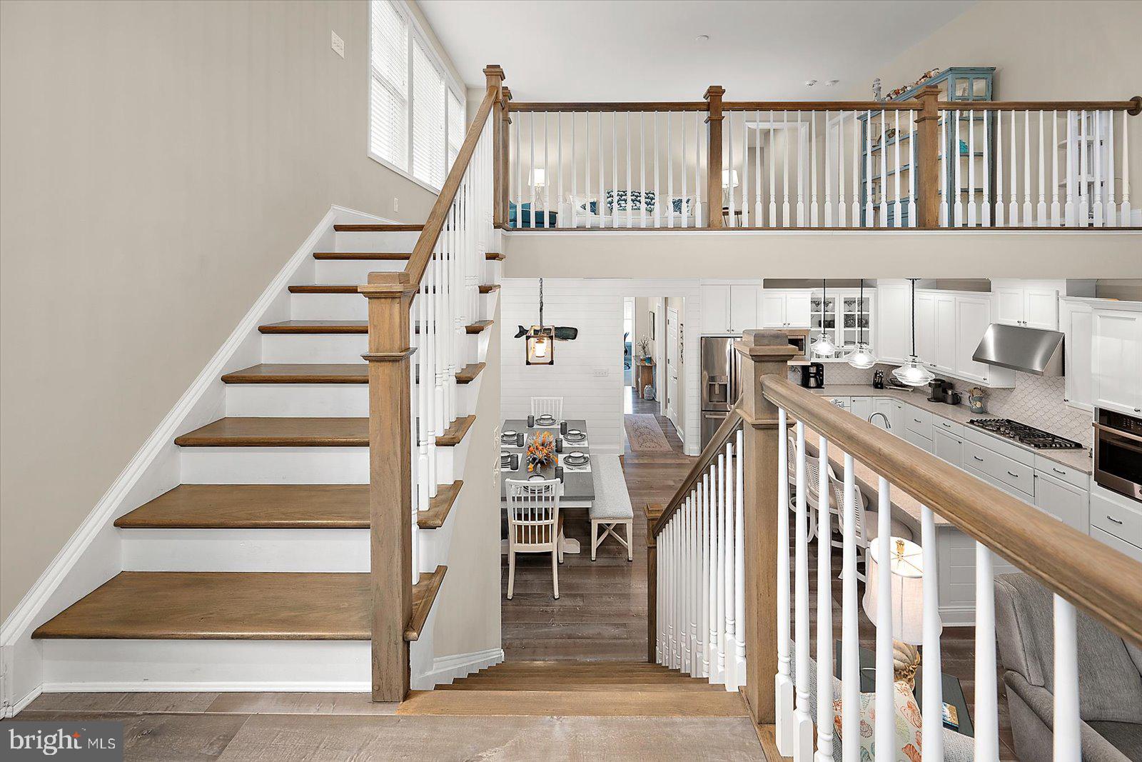 11271 Hall Road Lewes, DE 19958 - Photo 69 of 134 a view of entryway and hall with wooden floor