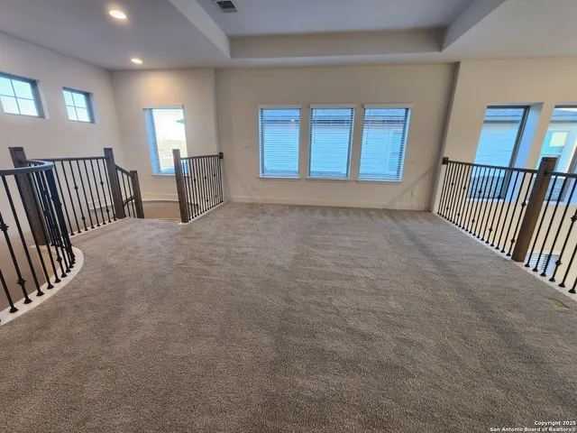 a view of a livingroom with a staircase