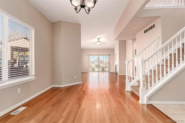 a view of entryway with wooden floor