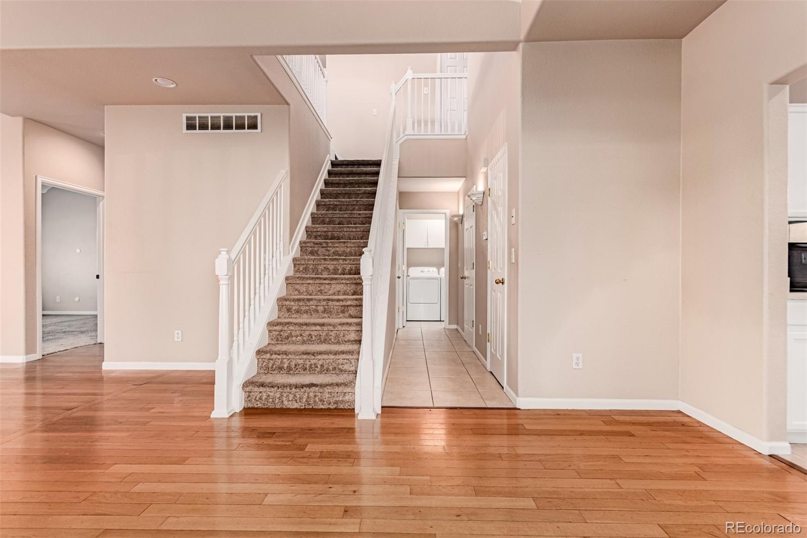 4538 South Atchison Way Aurora, CO 80015 - Photo 16 of 50 a view of entryway with wooden floor