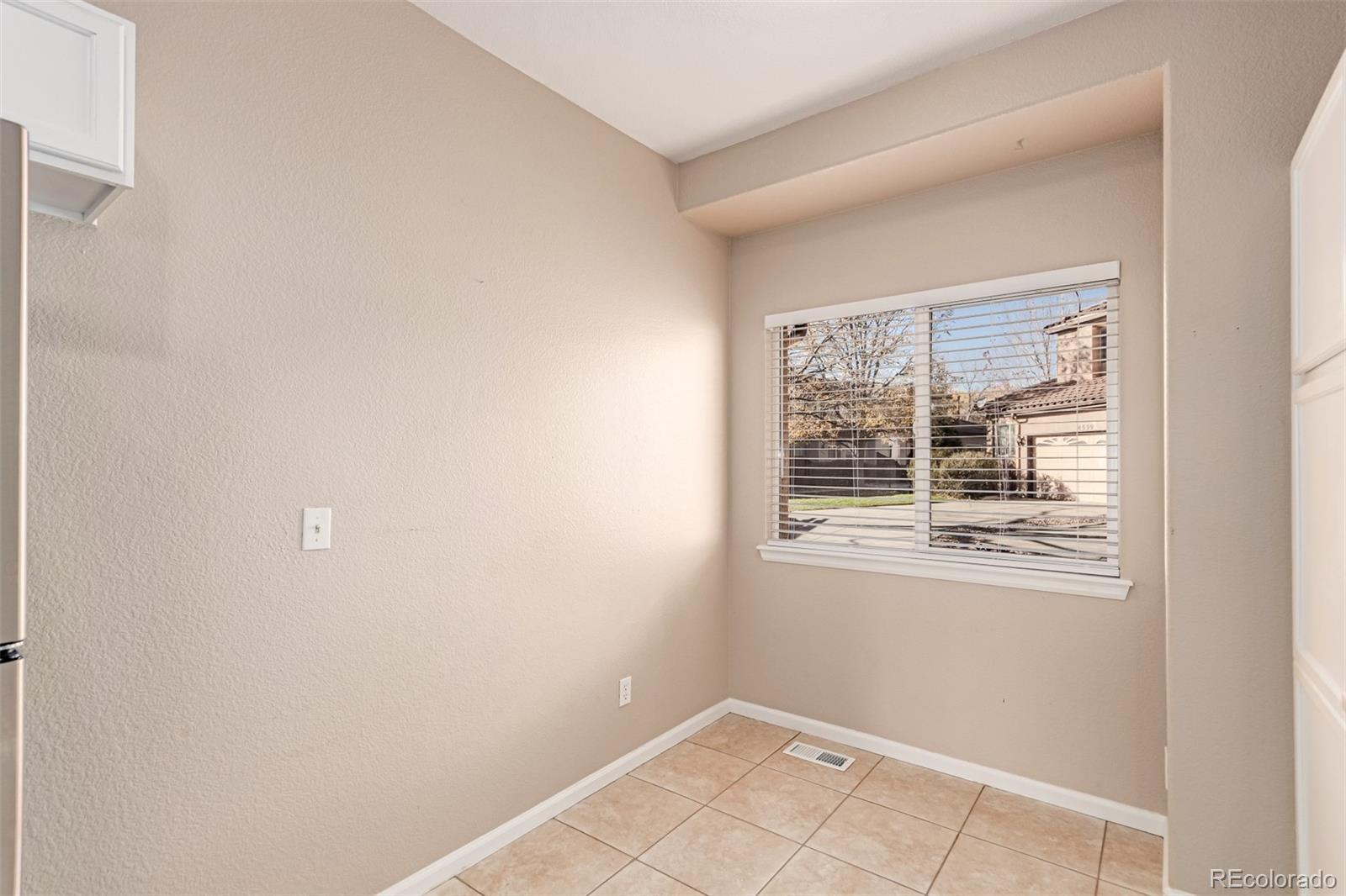 4538 South Atchison Way Aurora, CO 80015 - Photo 21 of 50 a view of an empty room with a window