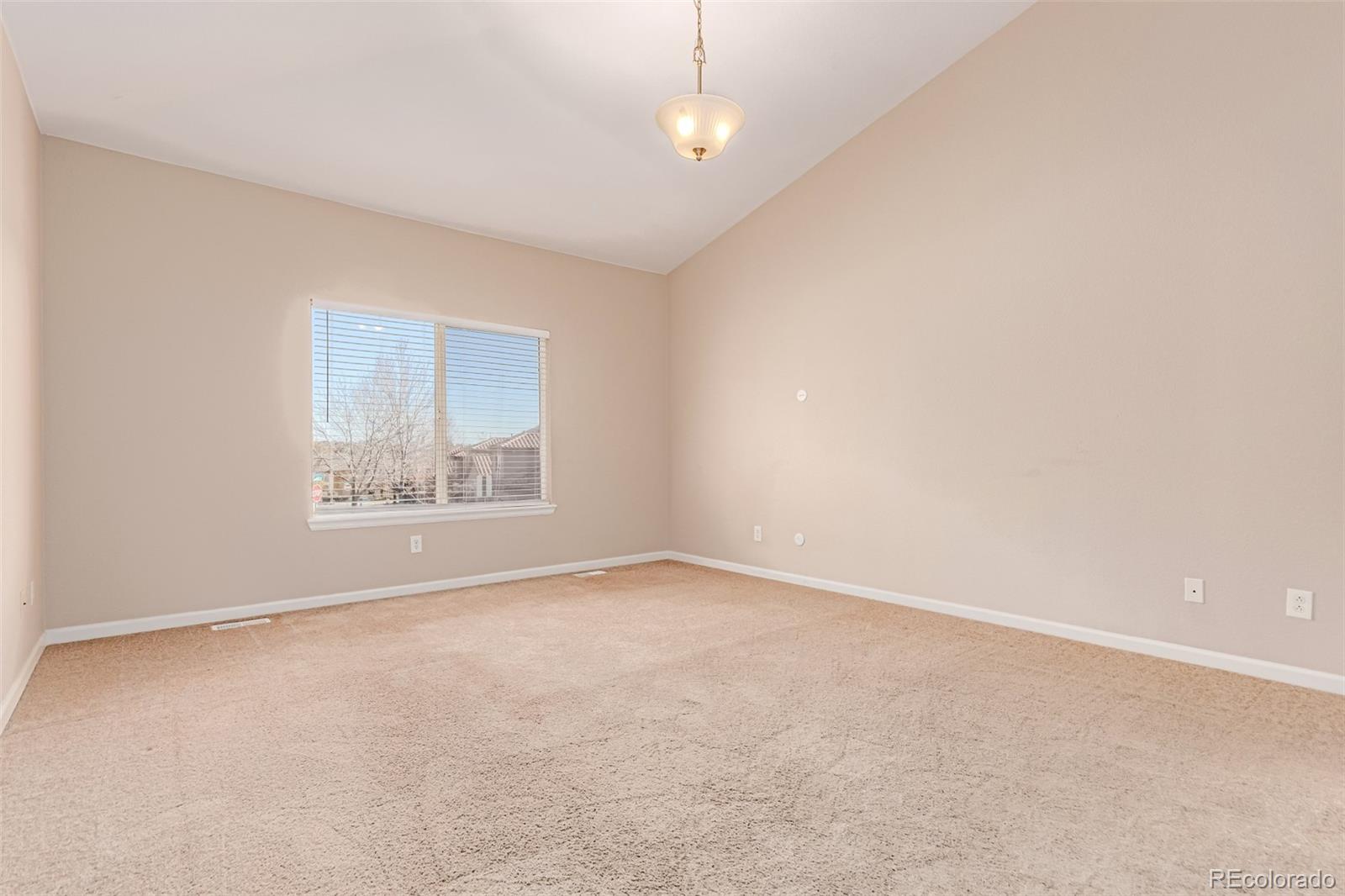 4538 South Atchison Way Aurora, CO 80015 - Photo 23 of 50 an empty room with a empty space and window