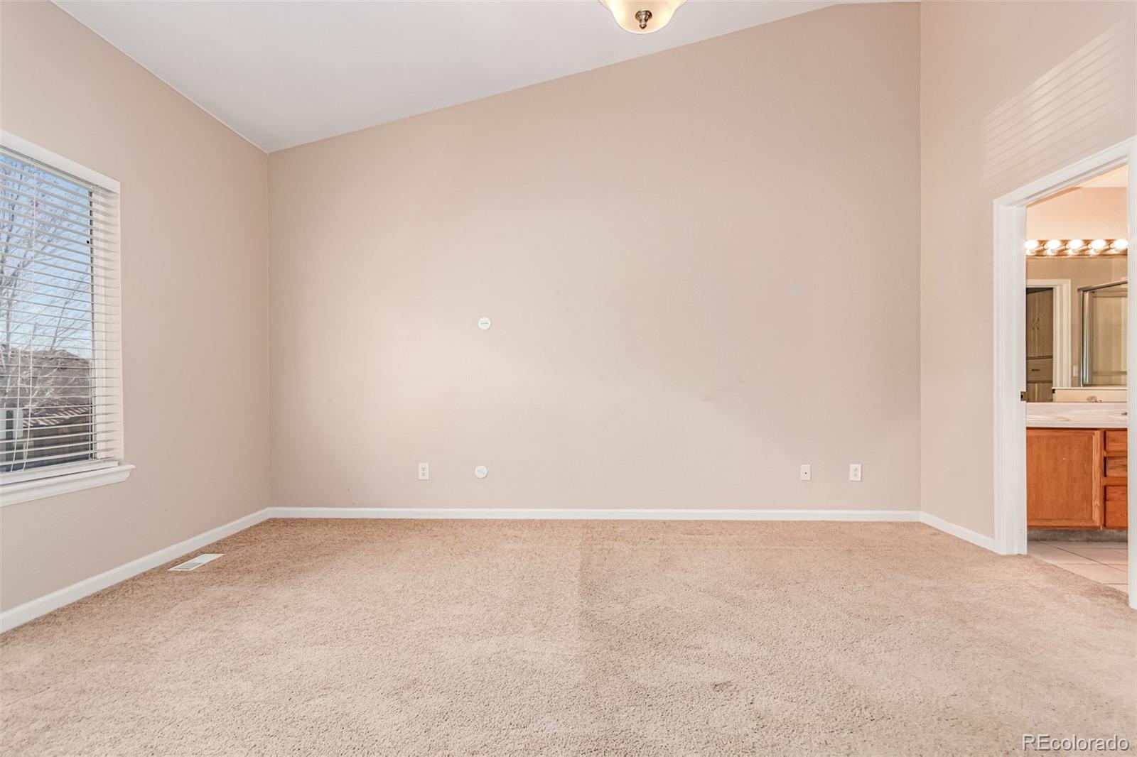 4538 South Atchison Way Aurora, CO 80015 - Photo 27 of 50 an empty room with windows