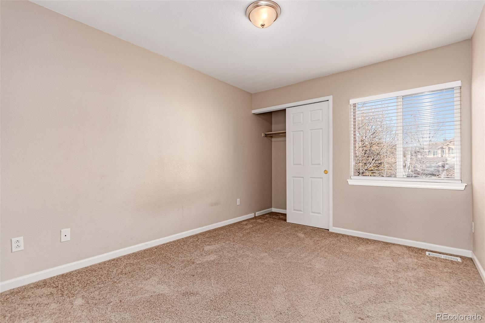 4538 South Atchison Way Aurora, CO 80015 - Photo 36 of 50 an empty room with windows