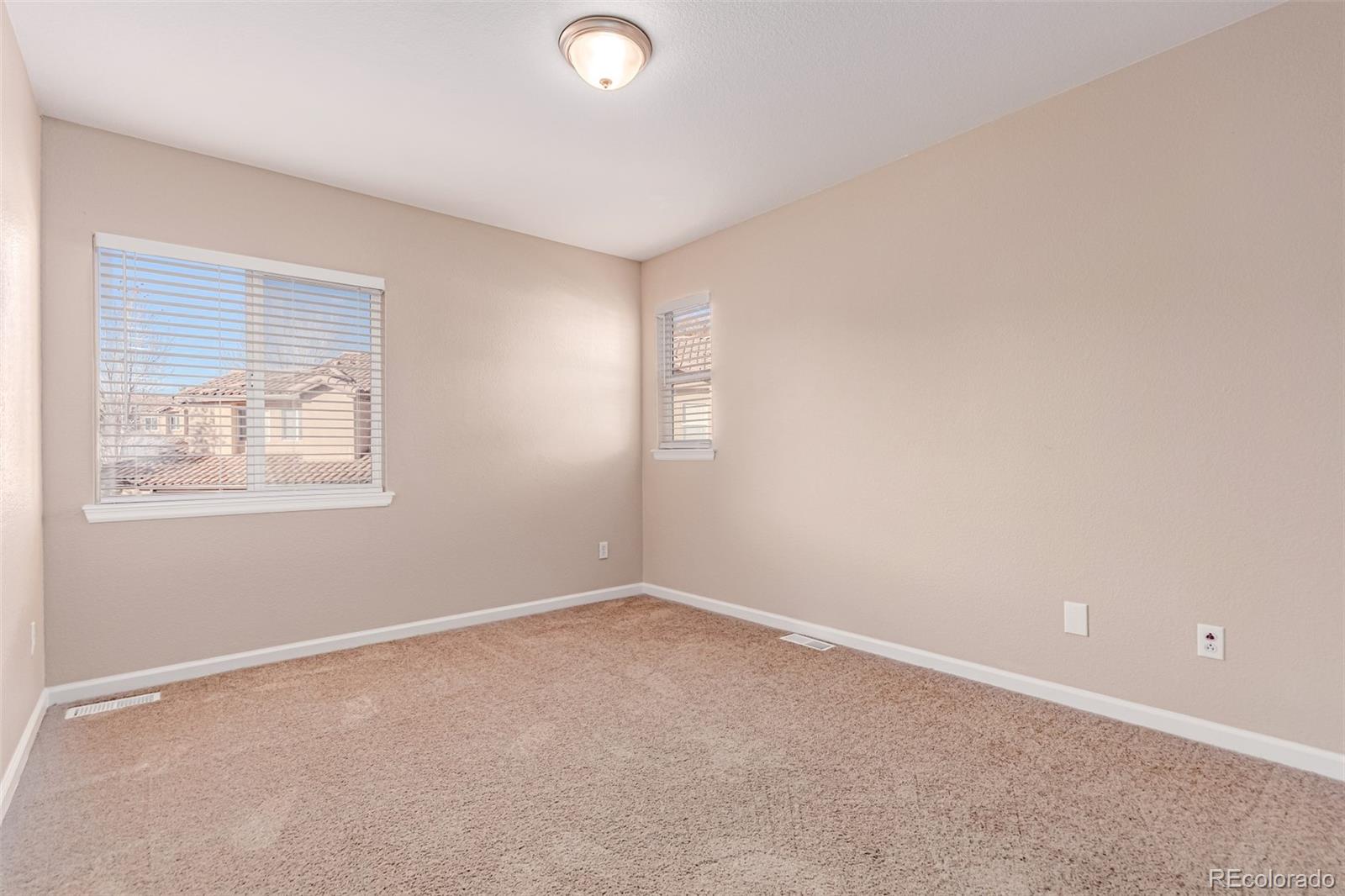 4538 South Atchison Way Aurora, CO 80015 - Photo 37 of 50 an empty room with windows