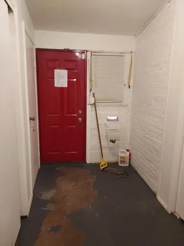 a view of a room with a door