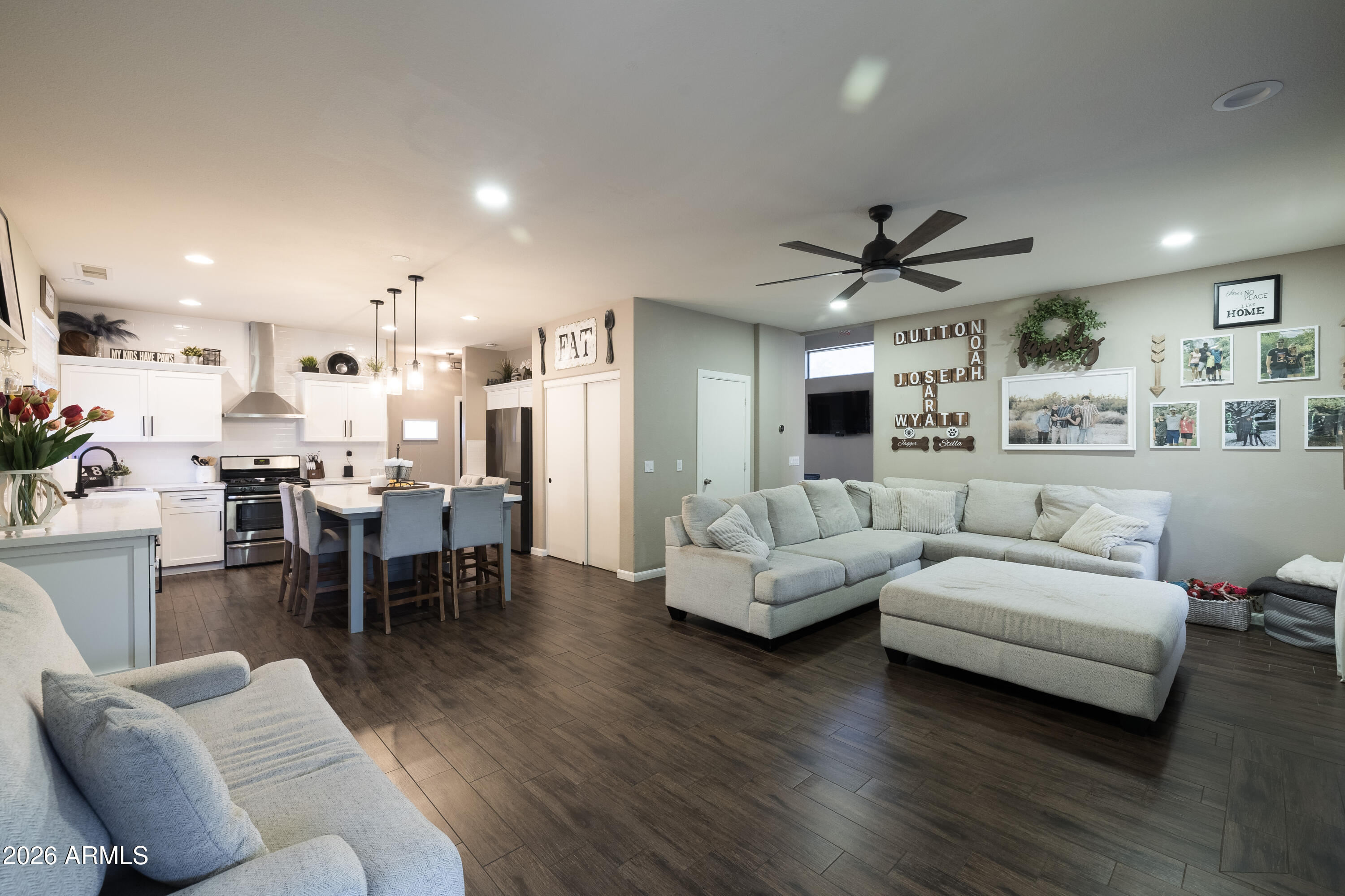 6407 West Saddlehorn Road Phoenix, AZ 85083 - Photo 20 of 41 a living room with furniture and view of kitchen
