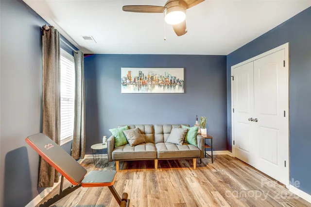 a view of livingroom with furniture and windows