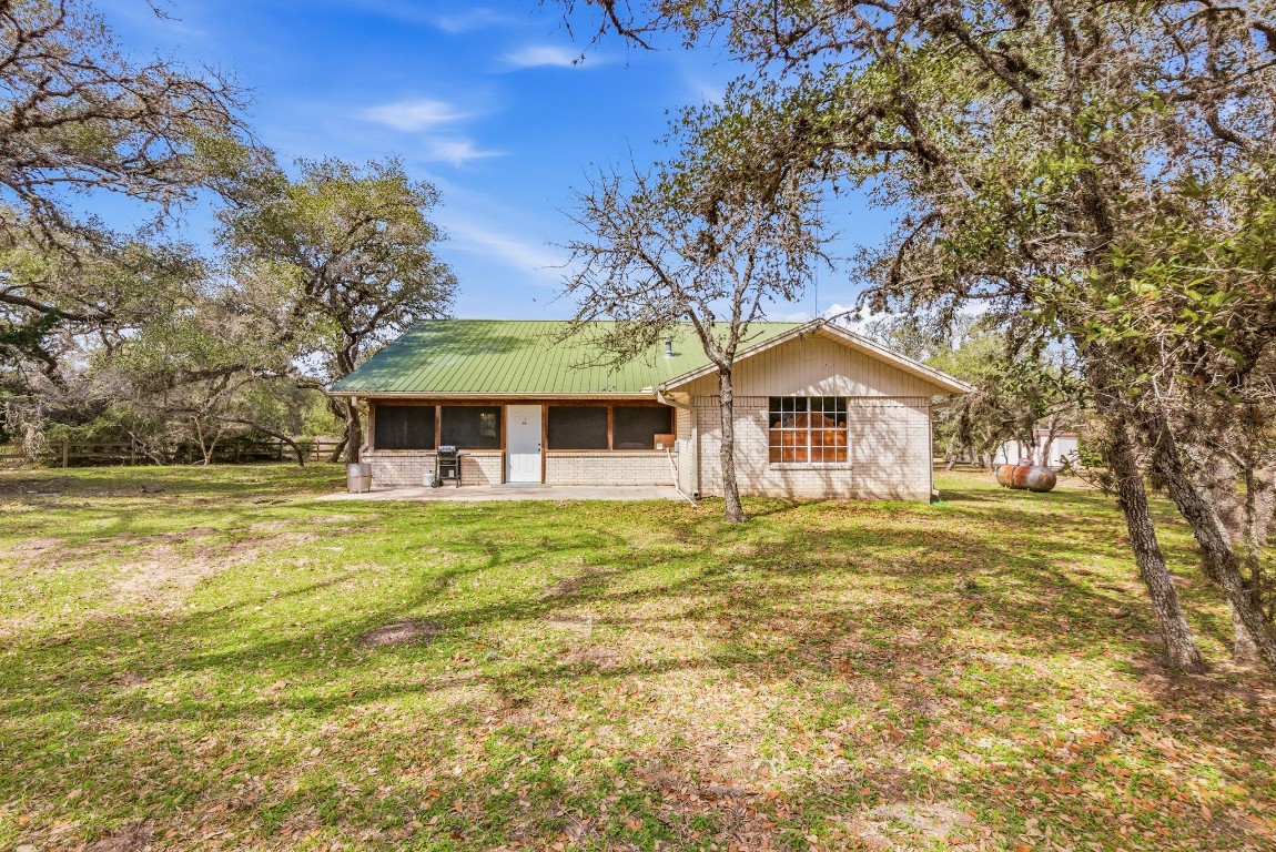 11847 Friar Road Cuero, TX 77954 - Photo 3 of 50 a front view of house with yard and green space