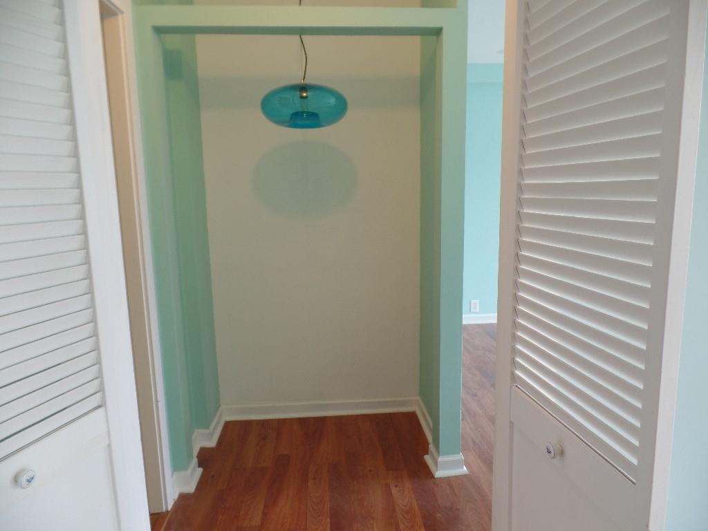 320 Fort Duquesne Boulevard, Unit 24M Pittsburgh, PA 15222 - Photo 7 of 40 a view of a hallway with wooden floor