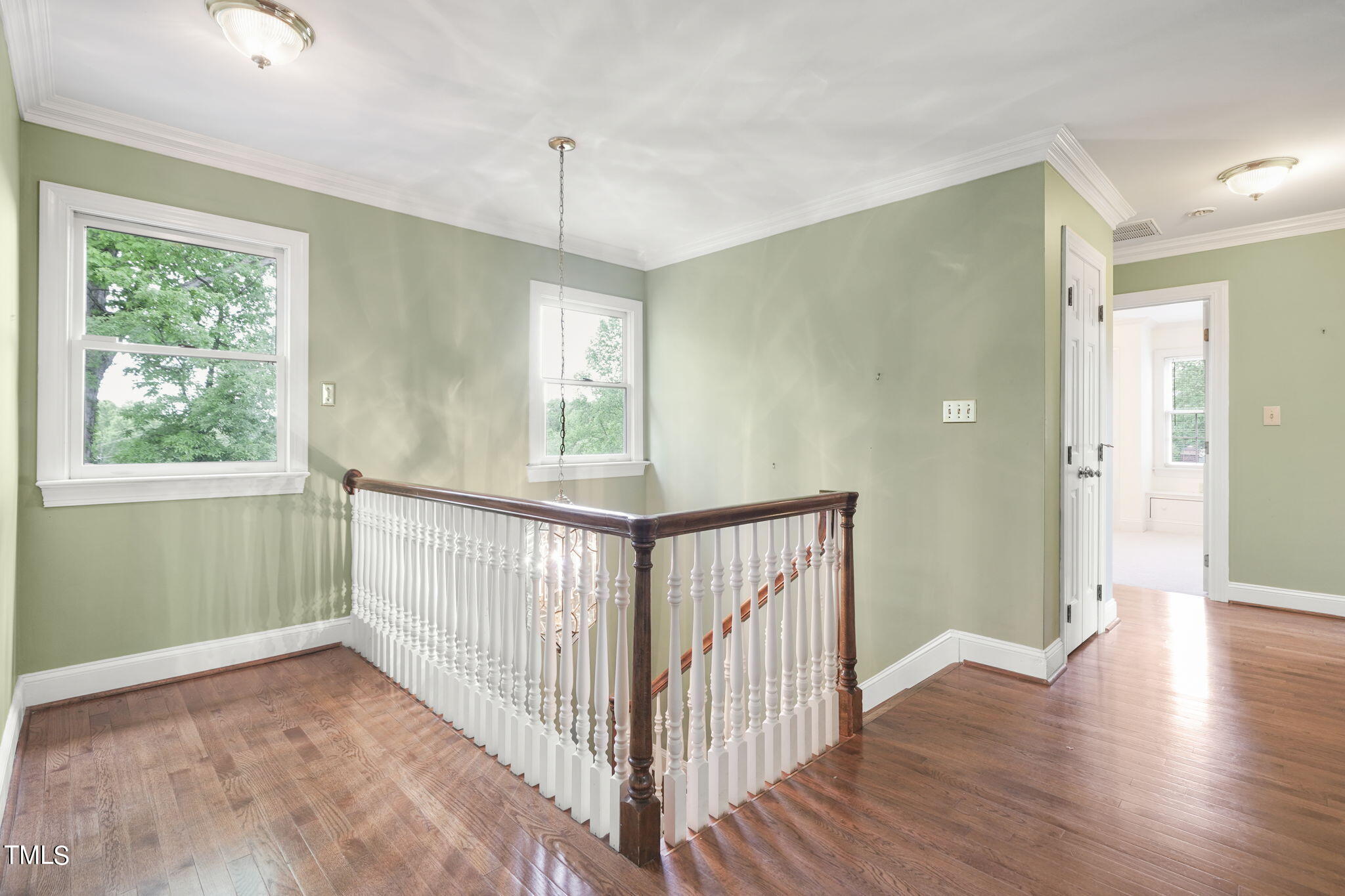 3100 Eton Road Raleigh, NC 27608 - Photo 27 of 45 a view of hallway with wooden floor