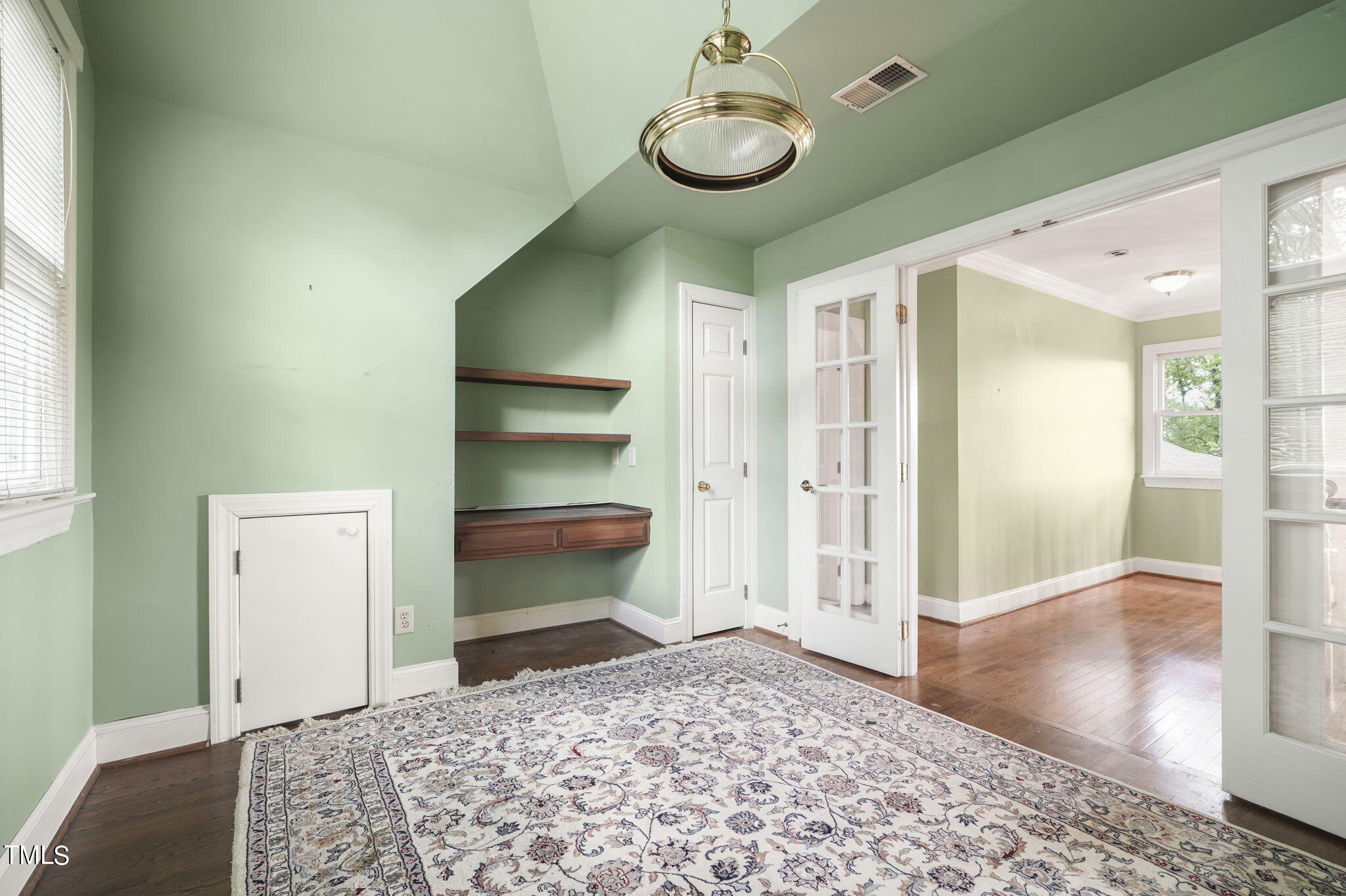 3100 Eton Road Raleigh, NC 27608 - Photo 28 of 45 a view of a hallway to a bedroom