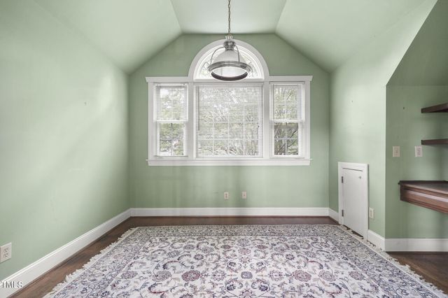 a view of a hallway to a bedroom