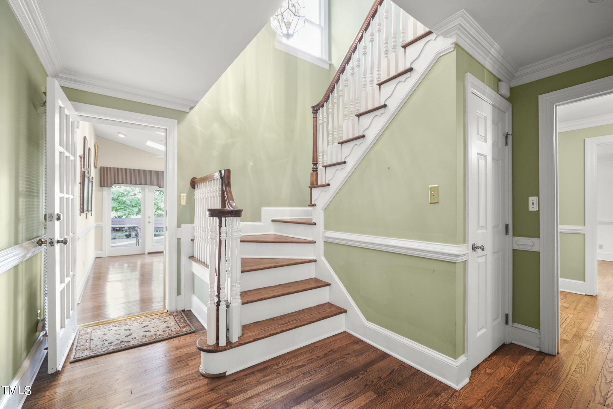 3100 Eton Road Raleigh, NC 27608 - Photo 6 of 45 a view of a room with wooden floor and windows