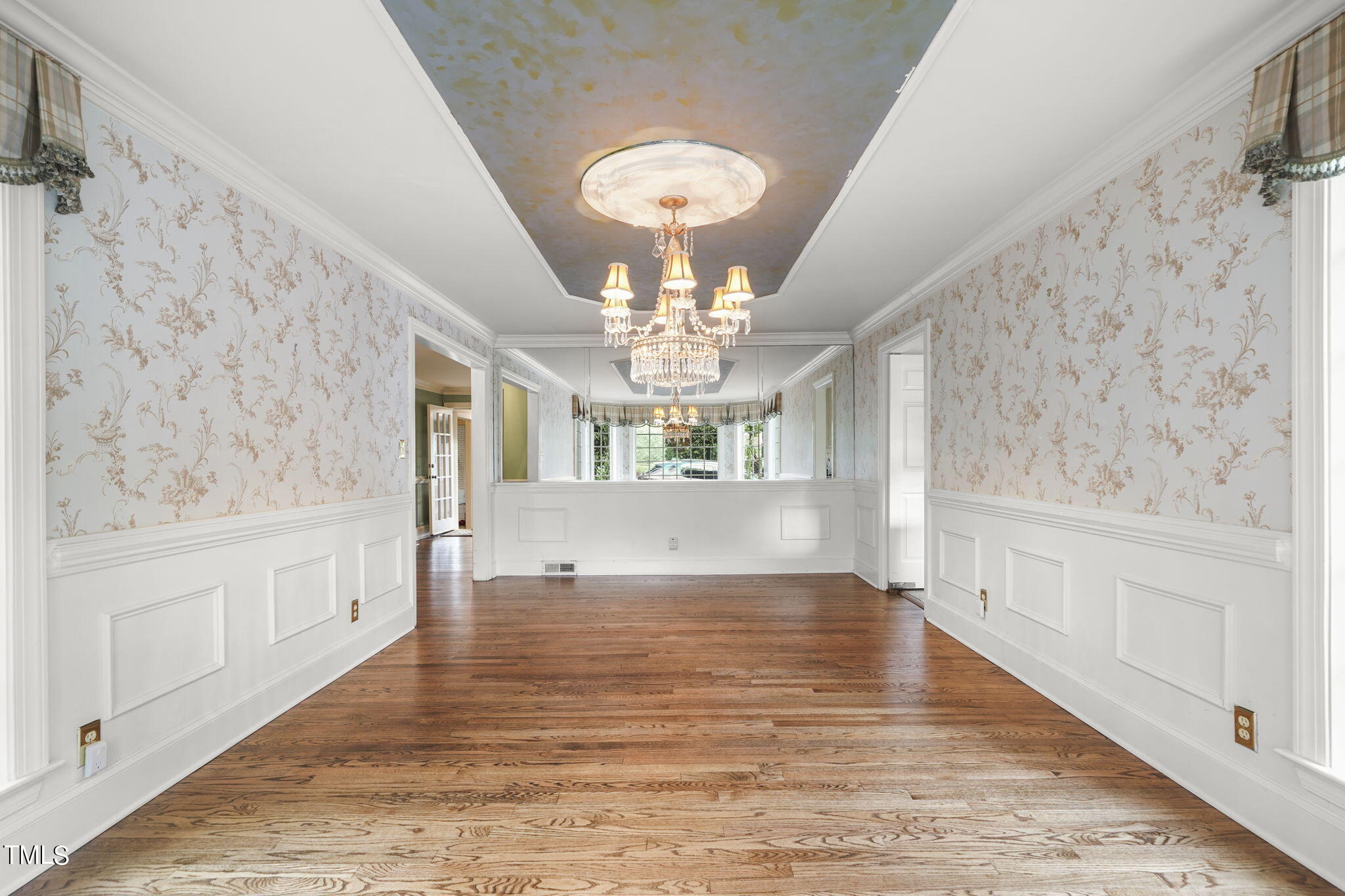 3100 Eton Road Raleigh, NC 27608 - Photo 9 of 45 a view of an empty room and chandelier