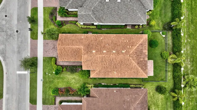 a kitchen with stainless steel appliances a refrigerator sink and microwave