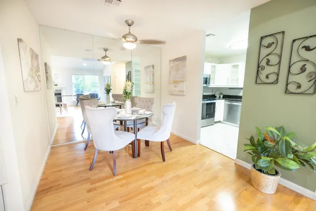 a view of a dining room with furniture