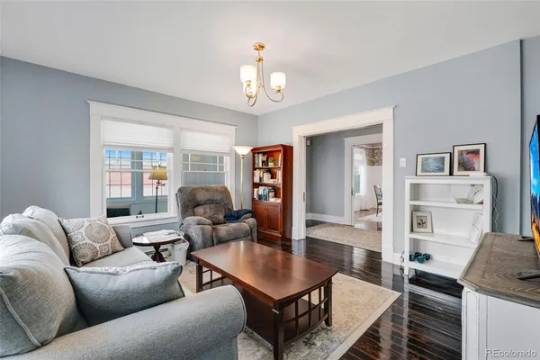 a kitchen with cabinets stainless steel appliances a sink and a window