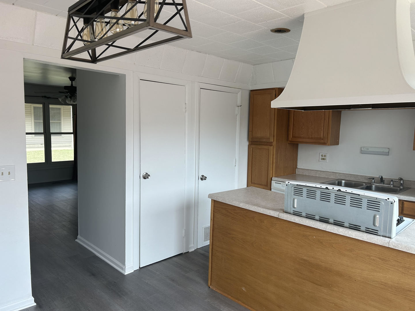 1713 Bristol Walk Hoffman Estates, IL 60169 - Photo 8 of 14 a kitchen with stainless steel appliances granite countertop a sink a stove and a refrigerator