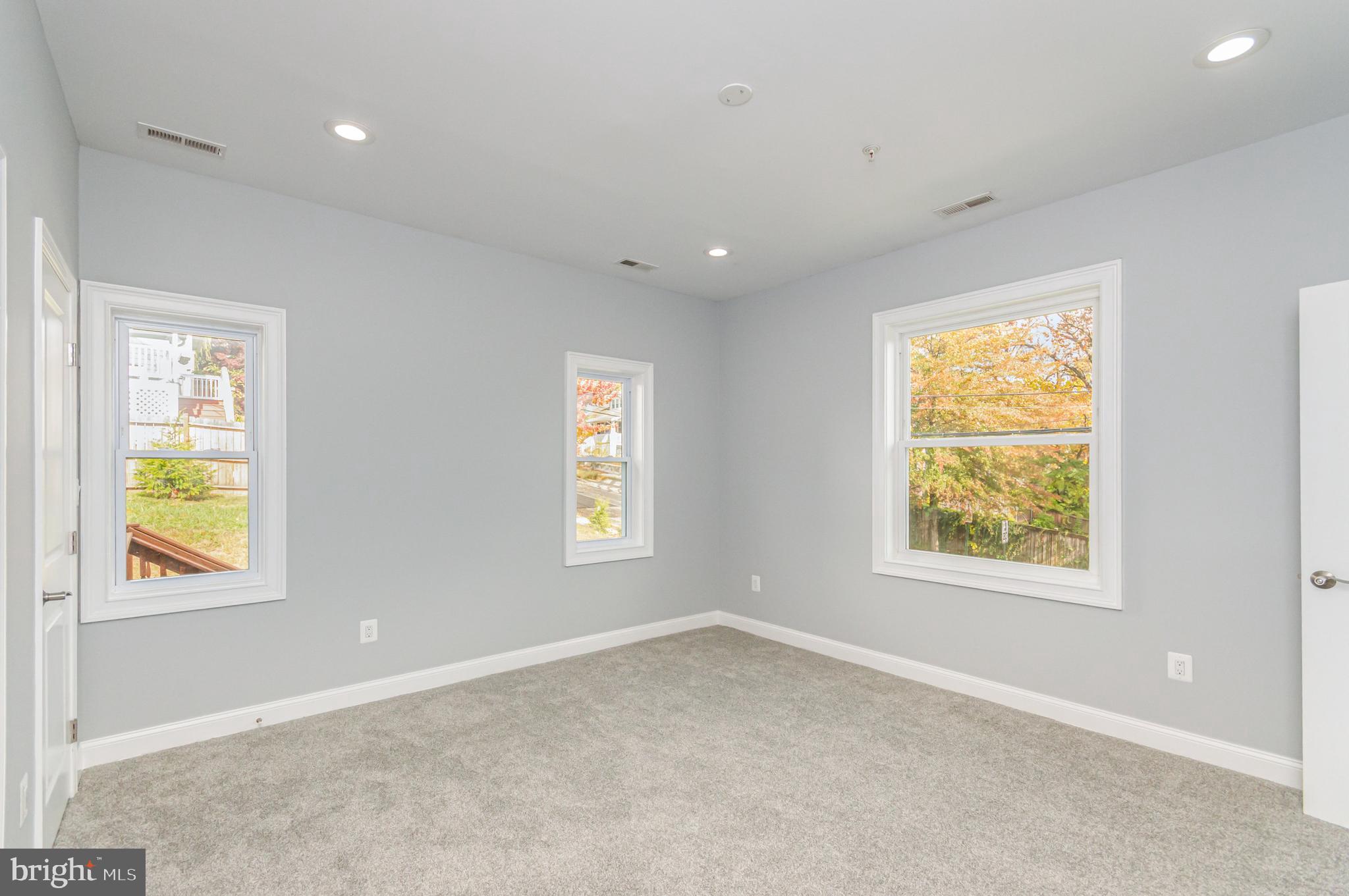 3110 Perry Street, Unit B Mount Rainier, MD 20712 - Photo 11 of 24 a view of an empty room with a window