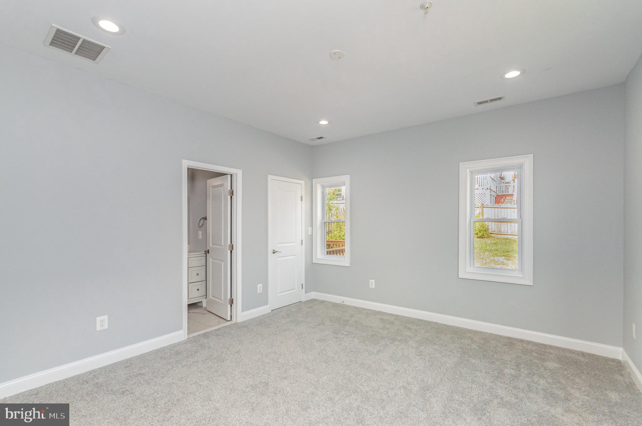 3110 Perry Street, Unit B Mount Rainier, MD 20712 - Photo 12 of 24 a view of an empty room with a window