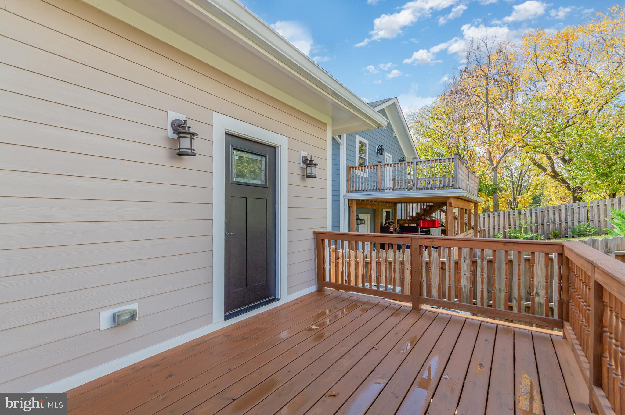 3110 Perry Street, Unit B Mount Rainier, MD 20712 - Photo 18 of 24 a view of a house with wooden deck