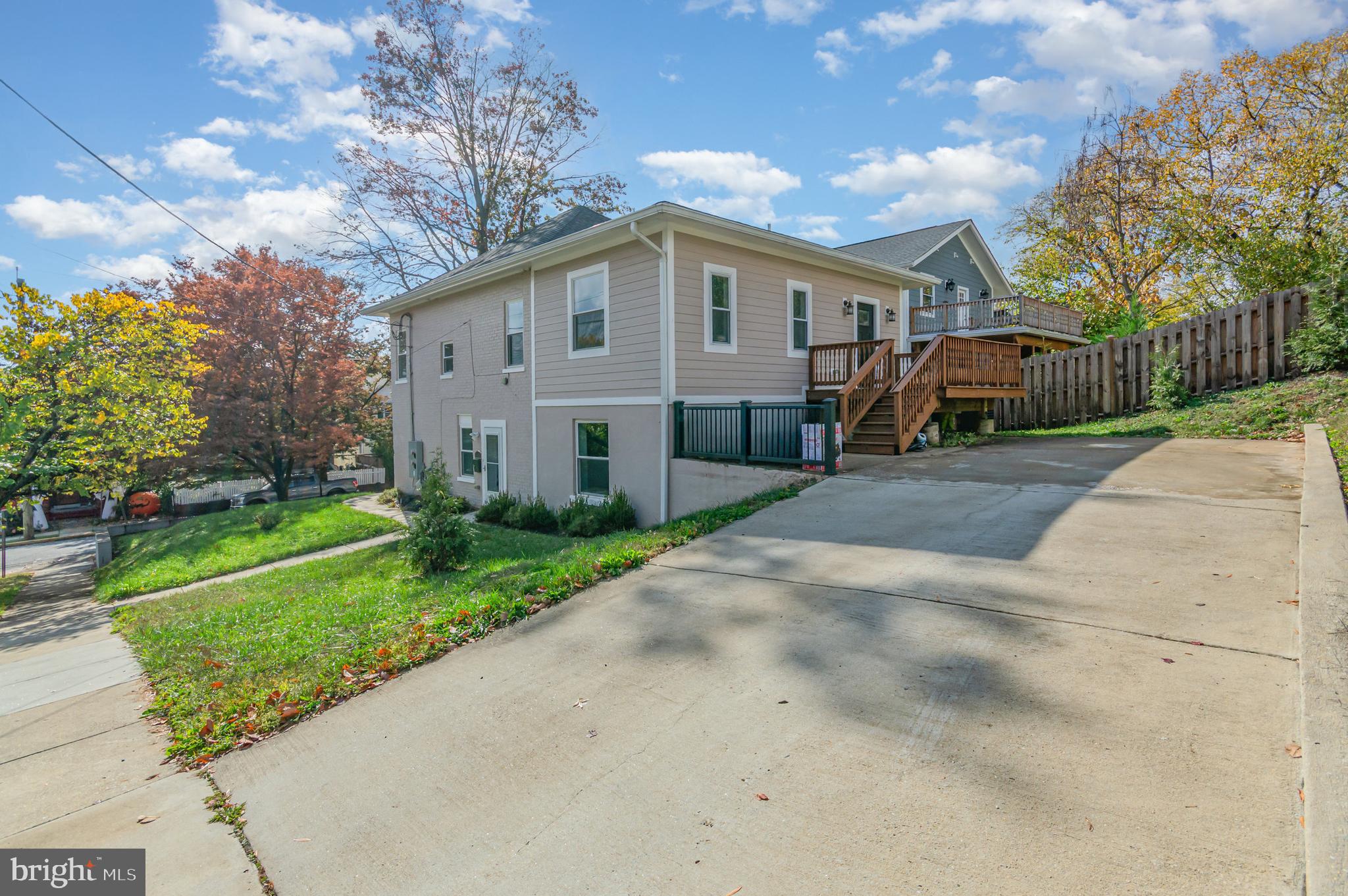 3110 Perry Street, Unit B Mount Rainier, MD 20712 - Photo 19 of 24 a view of a house with a yard