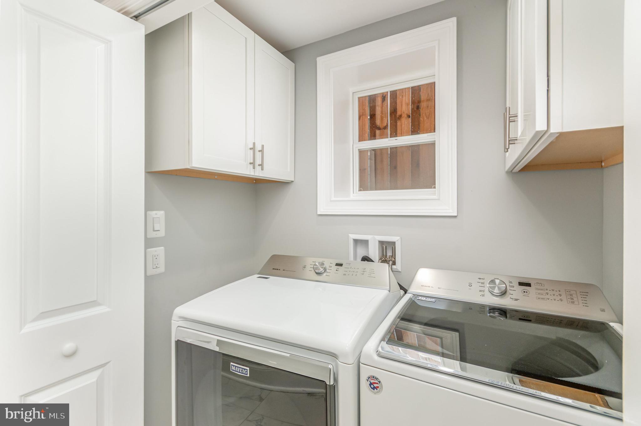 3110 Perry Street, Unit B Mount Rainier, MD 20712 - Photo 4 of 24 a utility room with dryer and washer