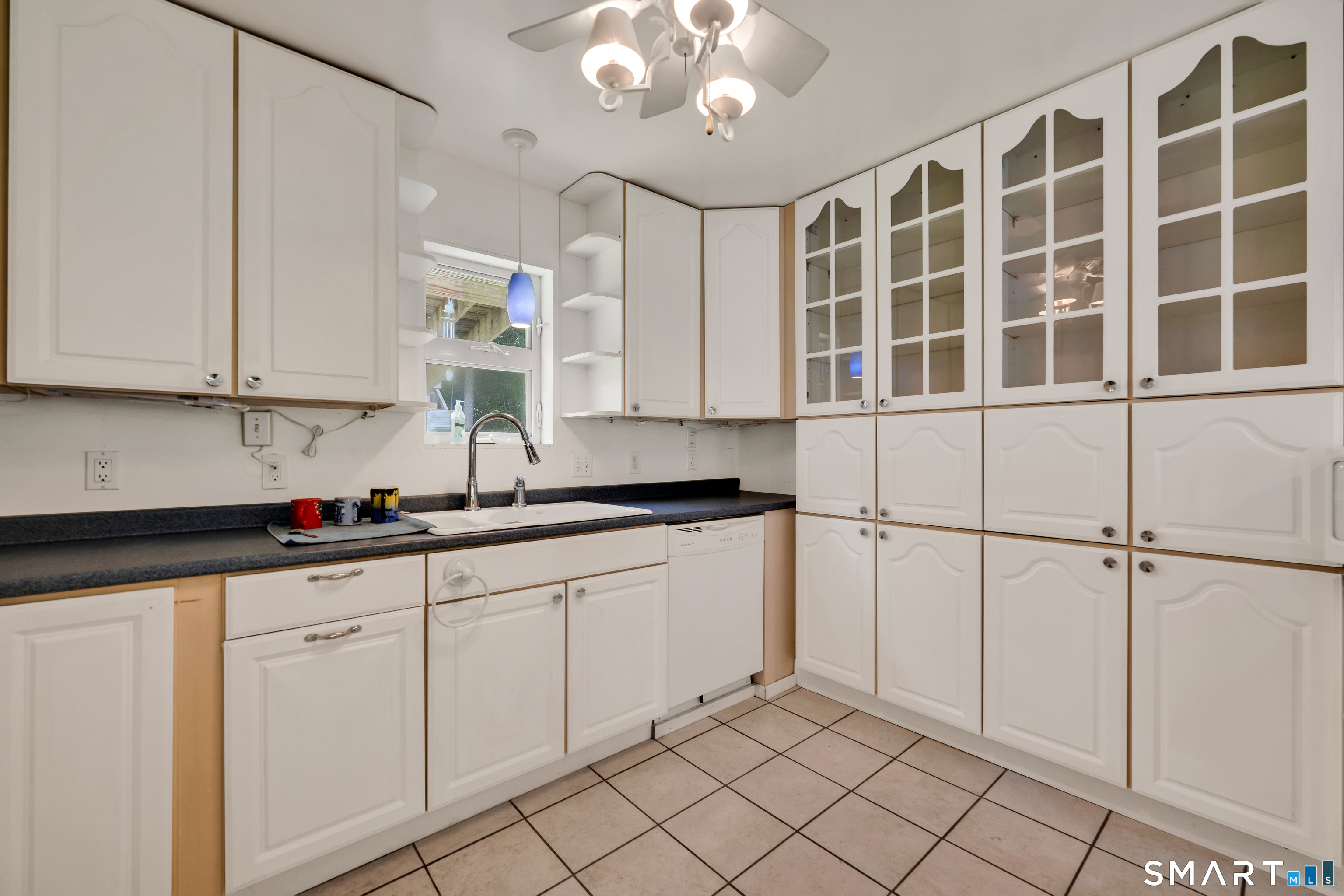 315 West Hill Road Torrington, CT 06790 - Photo 16 of 40 a kitchen with a sink and cabinets