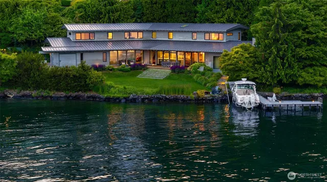 a view of a lake with a building in the background and lake view