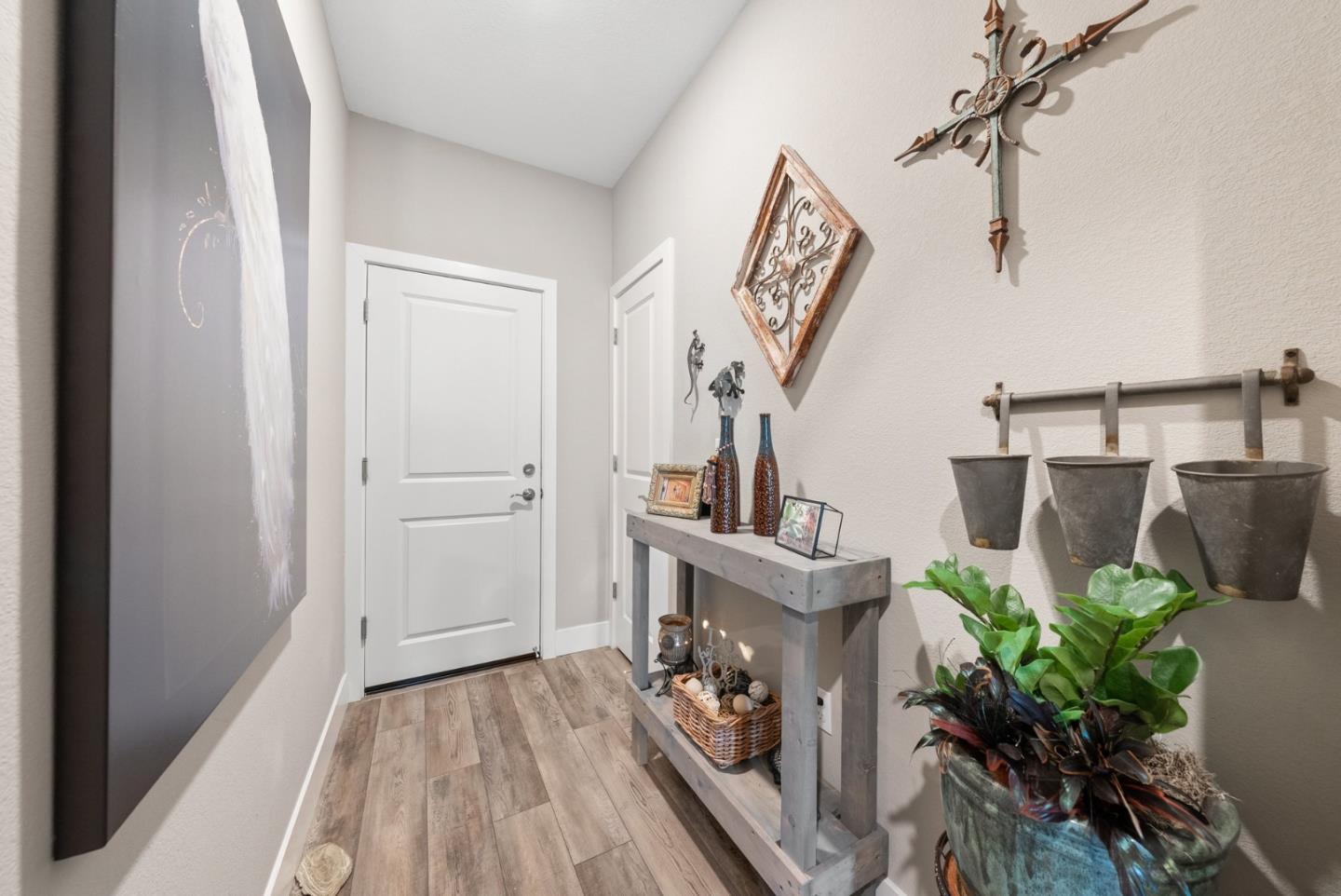 6725 Magnetic Loop San Jose, CA 95119 - Photo 11 of 68 a living room with furniture and a potted plant