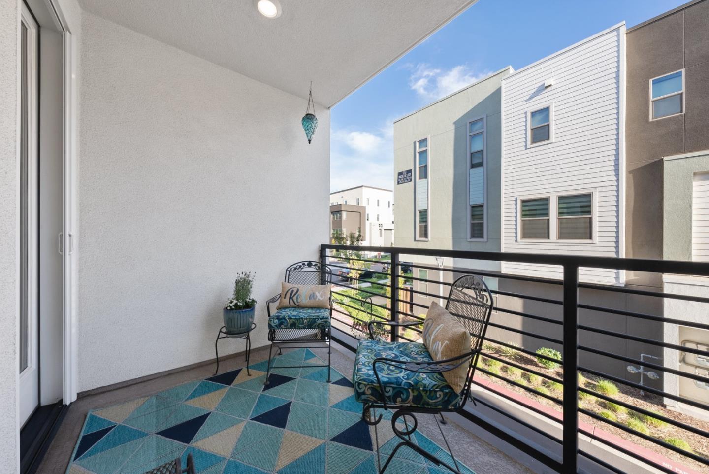 6725 Magnetic Loop San Jose, CA 95119 - Photo 15 of 68 a view of a dining room with furniture window and wooden floor
