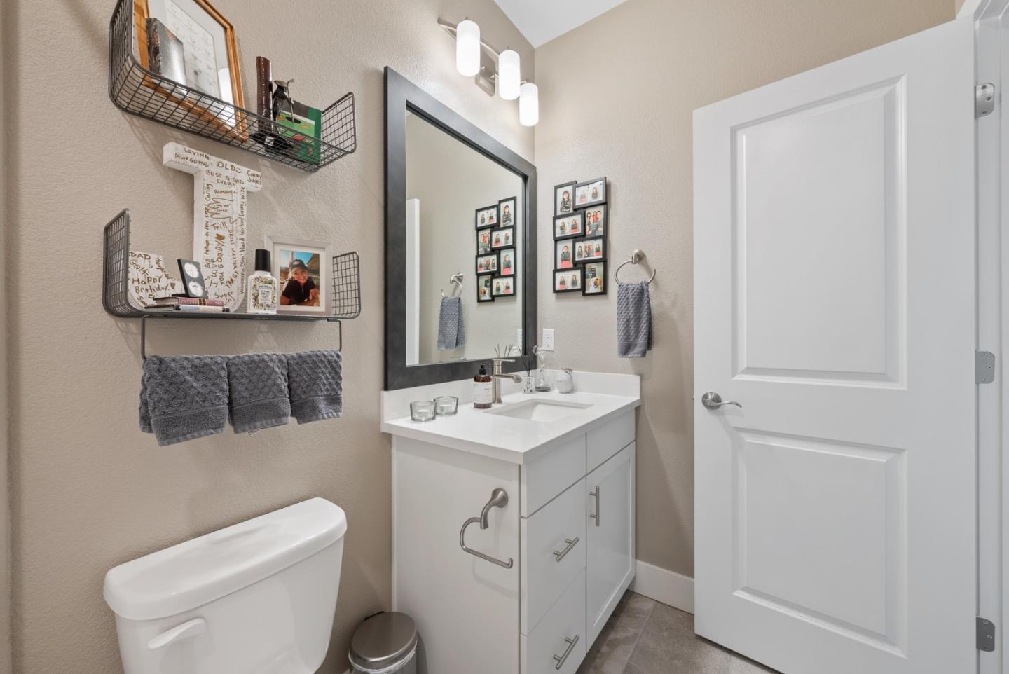 6725 Magnetic Loop San Jose, CA 95119 - Photo 32 of 68 a bathroom with a sink toilet and mirror