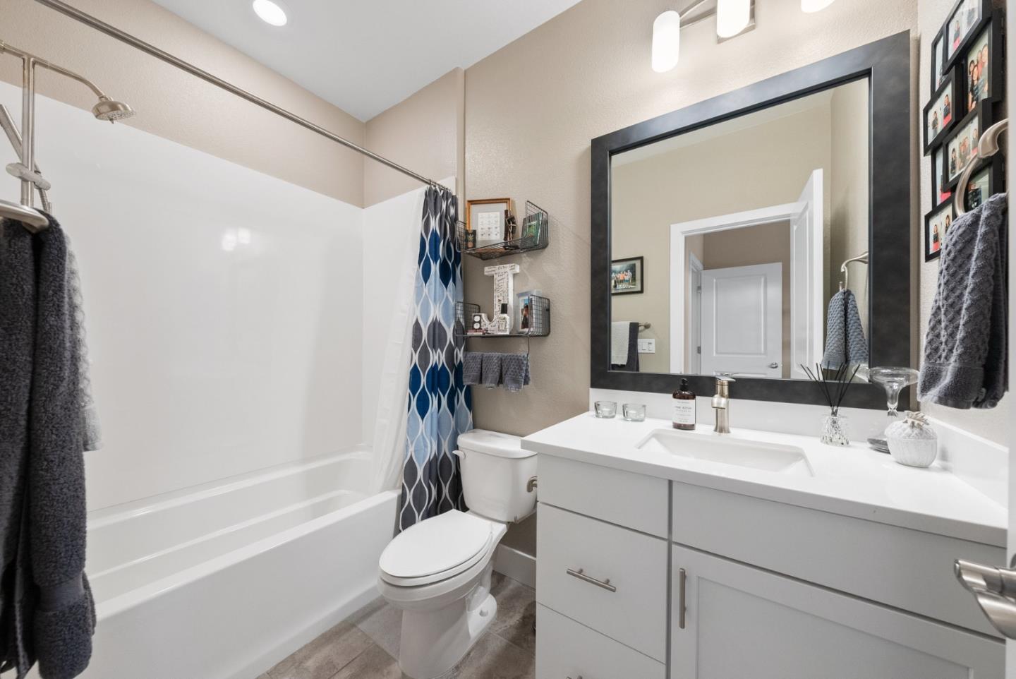 6725 Magnetic Loop San Jose, CA 95119 - Photo 33 of 68 a bathroom with a sink a toilet and shower