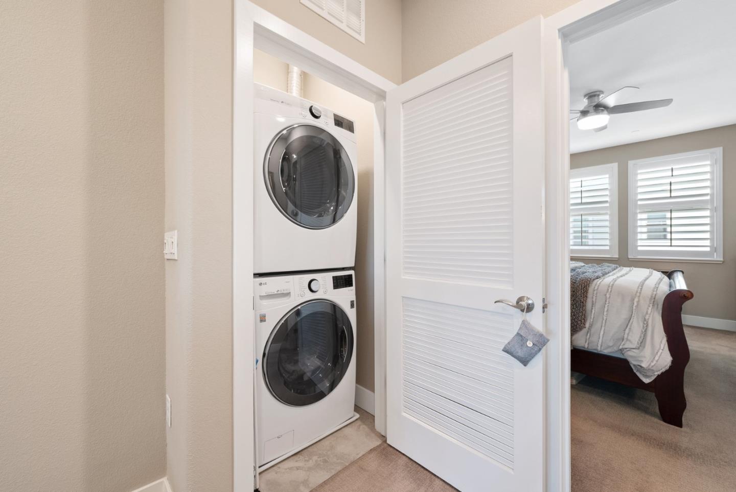 6725 Magnetic Loop San Jose, CA 95119 - Photo 34 of 68 a view of a bedroom with washer and dryer