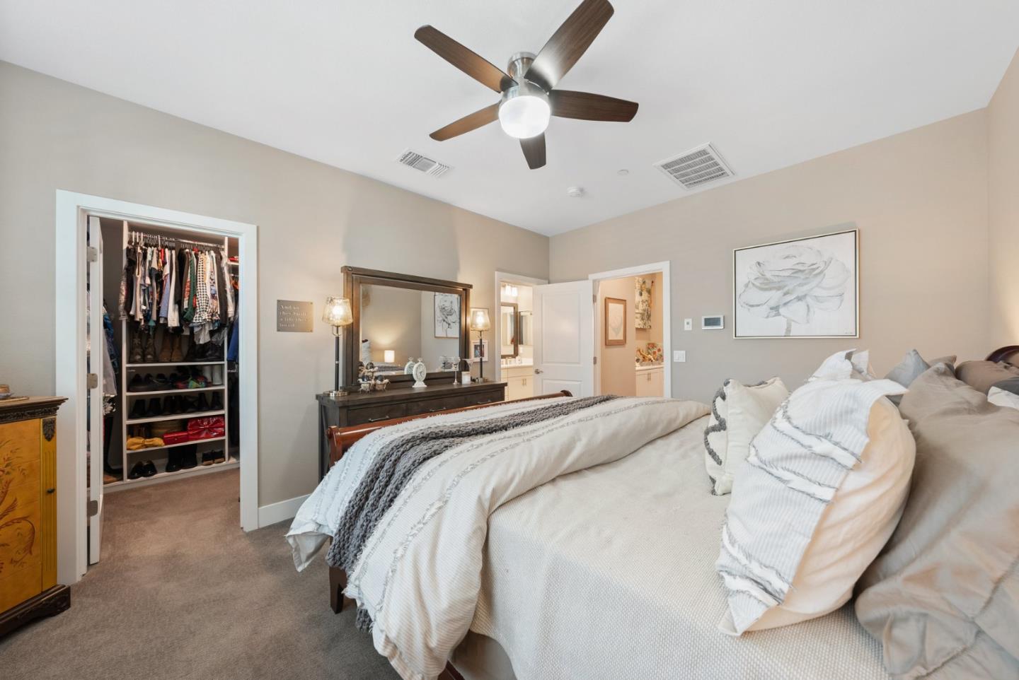 6725 Magnetic Loop San Jose, CA 95119 - Photo 35 of 68 a bed room with a bed and a ceiling fan