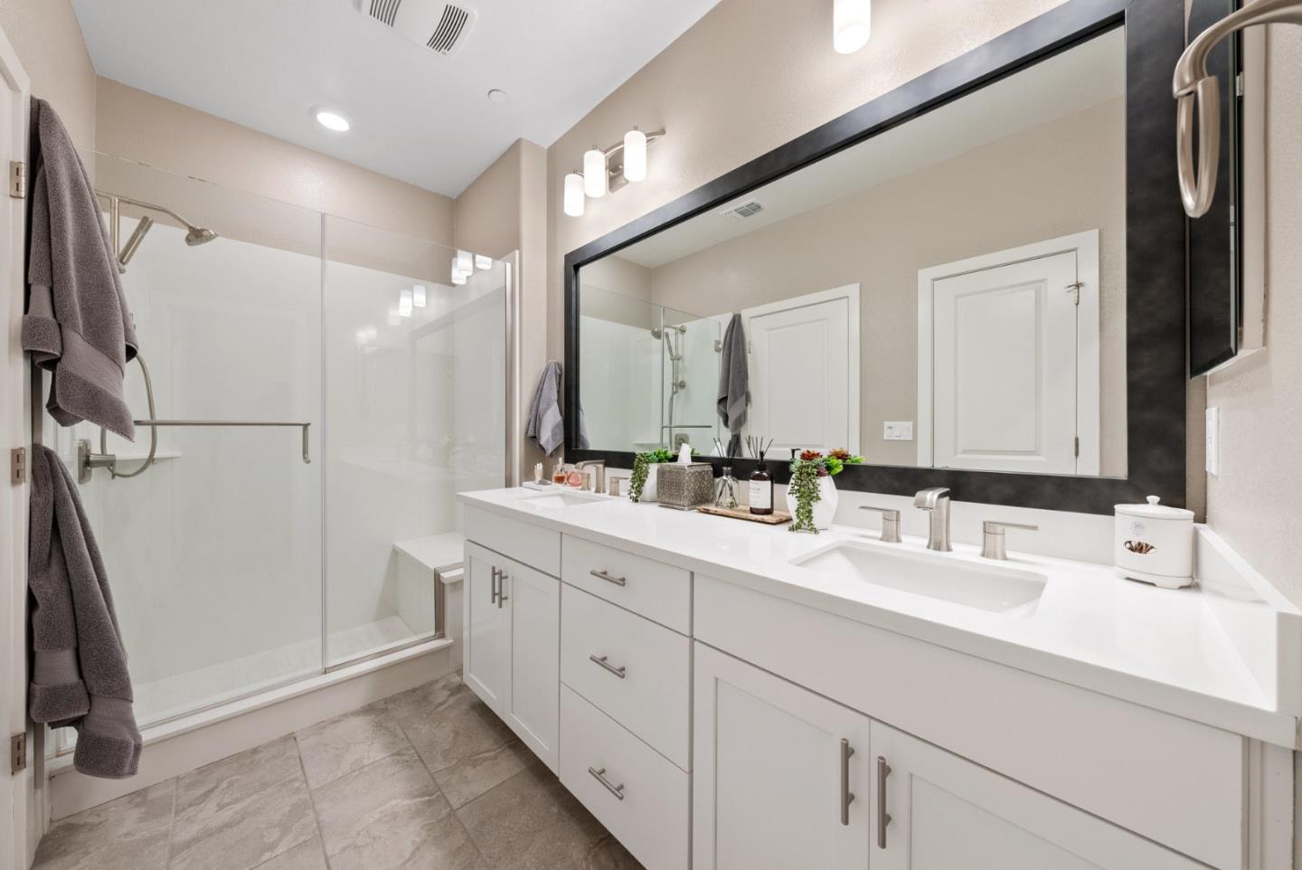 6725 Magnetic Loop San Jose, CA 95119 - Photo 39 of 68 a bathroom with a double vanity sink mirror and double