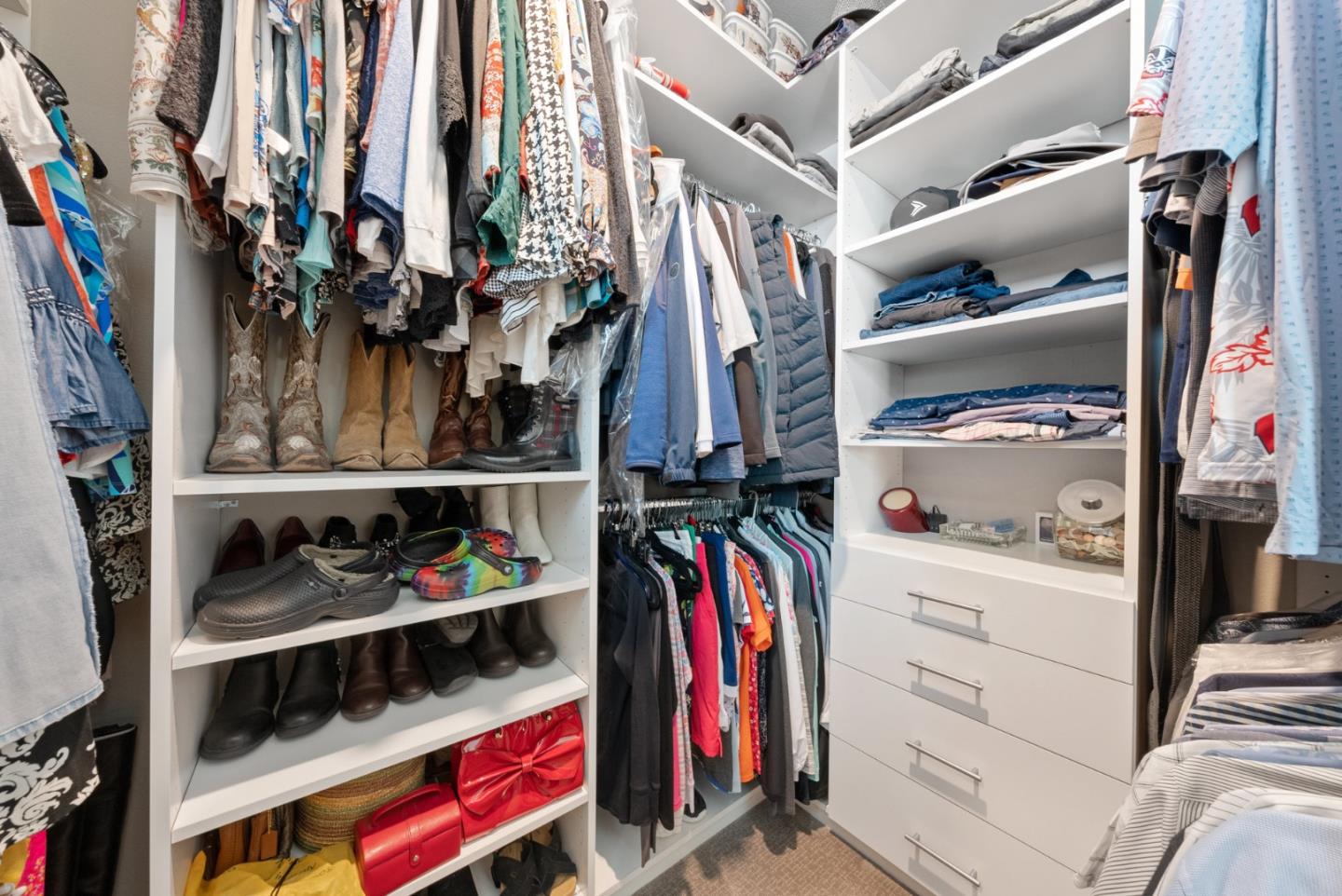 6725 Magnetic Loop San Jose, CA 95119 - Photo 42 of 68 a view of walk in closet with clothes and shoes