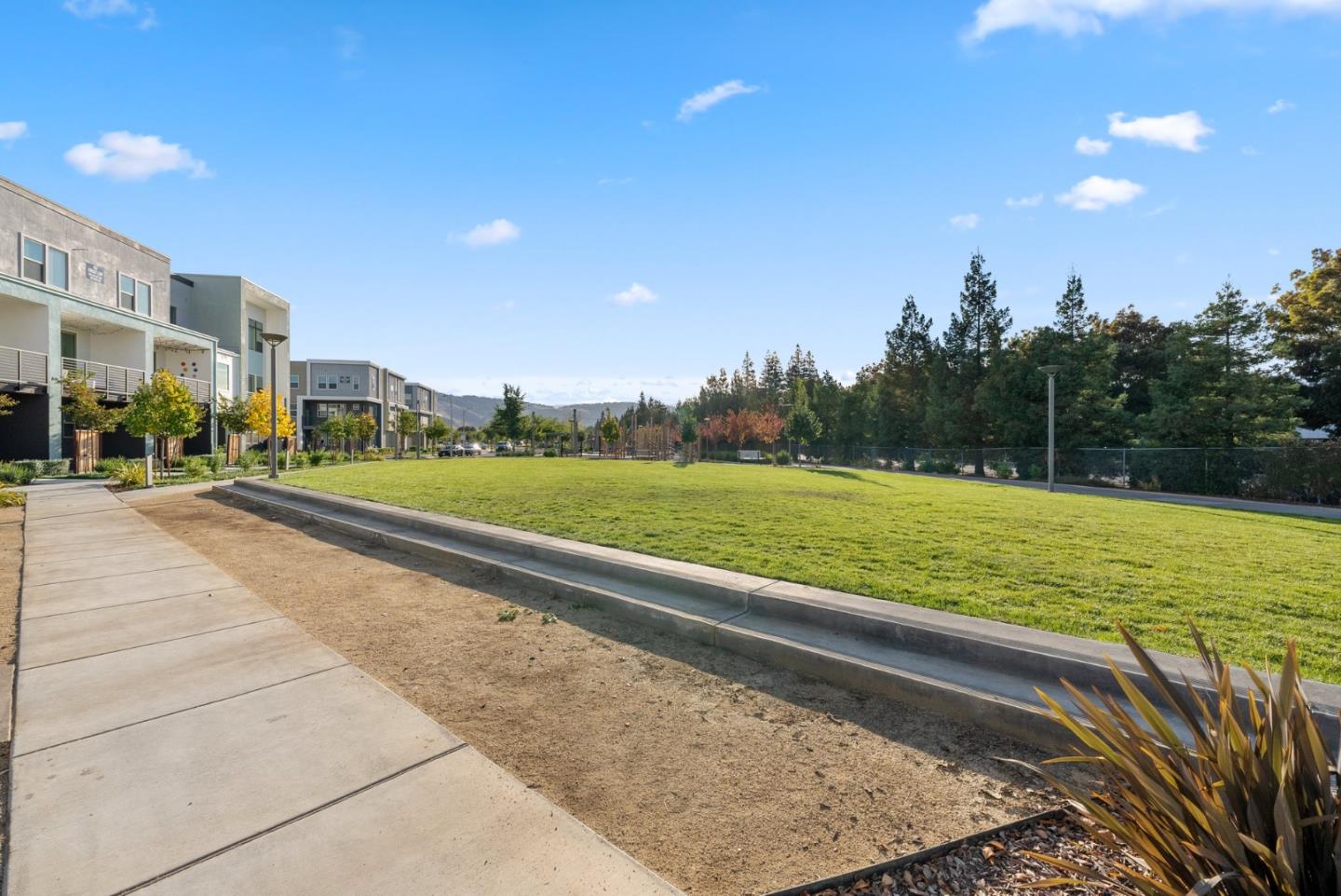 6725 Magnetic Loop San Jose, CA 95119 - Photo 50 of 68 a view of a swimming pool and a yard