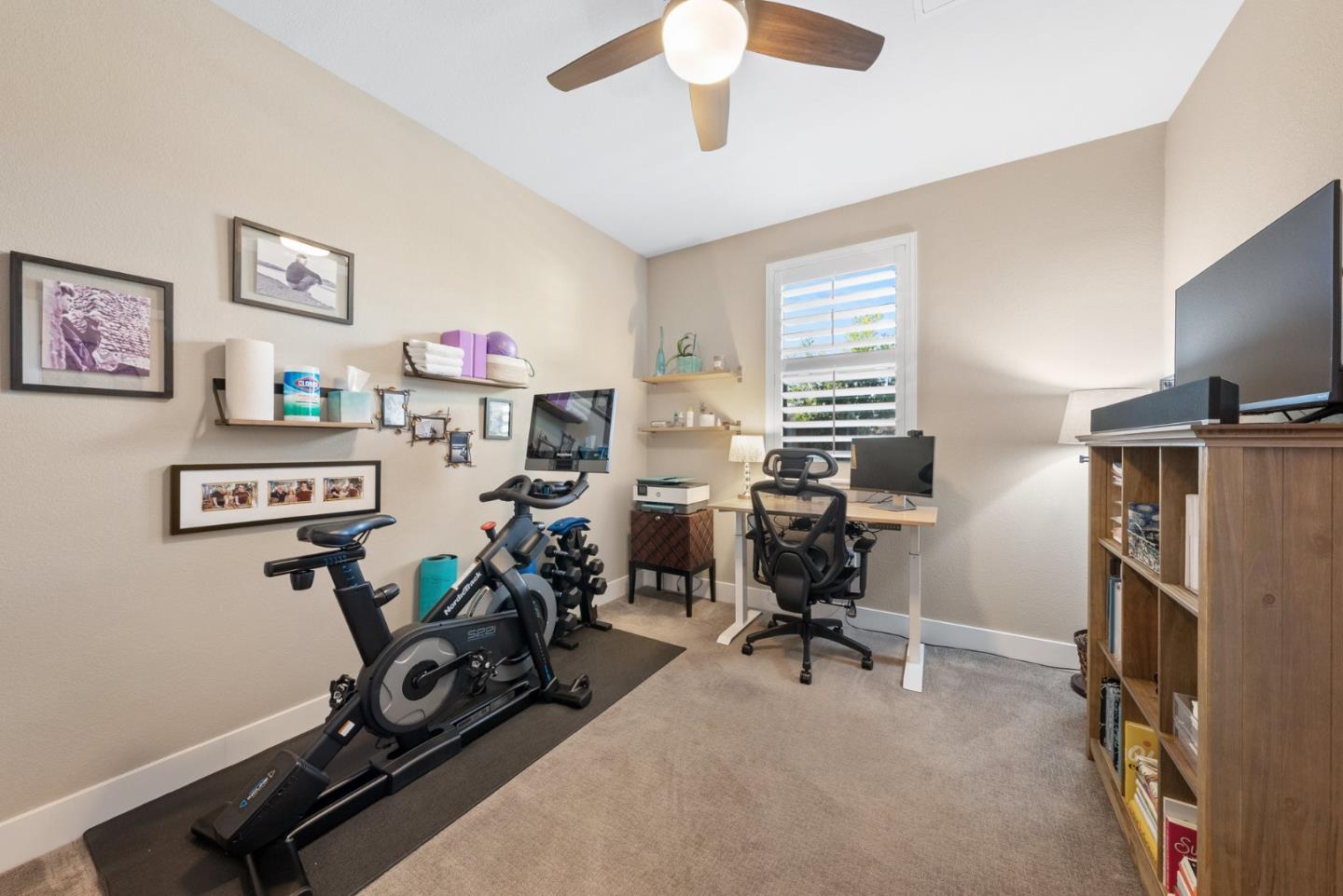 6725 Magnetic Loop San Jose, CA 95119 - Photo 6 of 68 a view of a workspace with furniture and a window