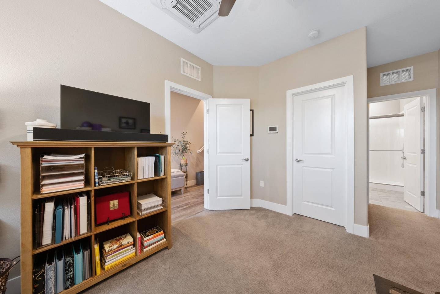 6725 Magnetic Loop San Jose, CA 95119 - Photo 7 of 68 a living room with furniture and a flat screen tv