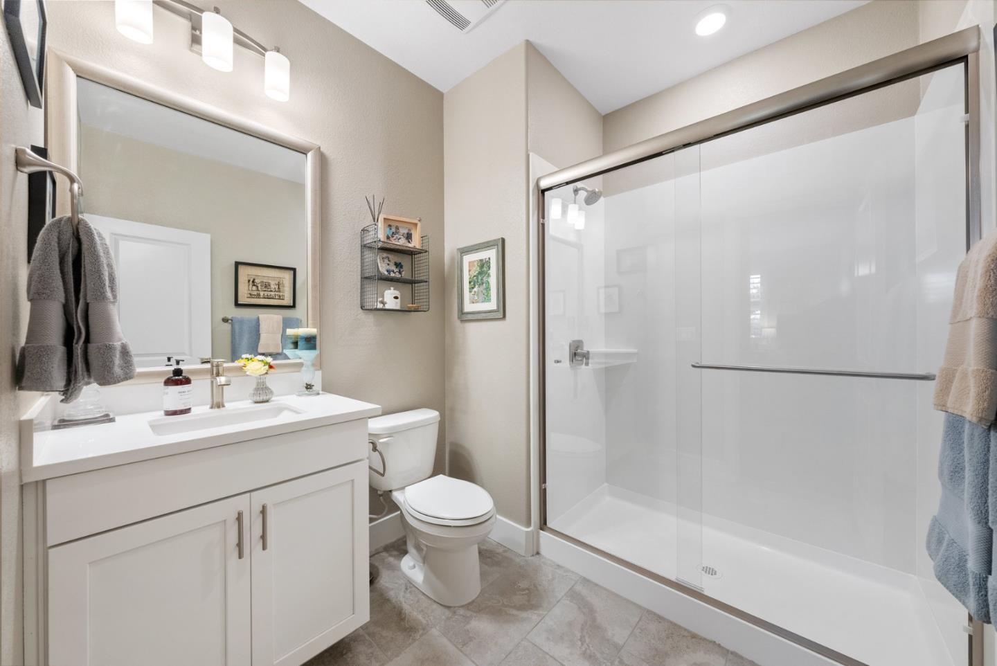 6725 Magnetic Loop San Jose, CA 95119 - Photo 9 of 68 a bathroom with a sink toilet and shower