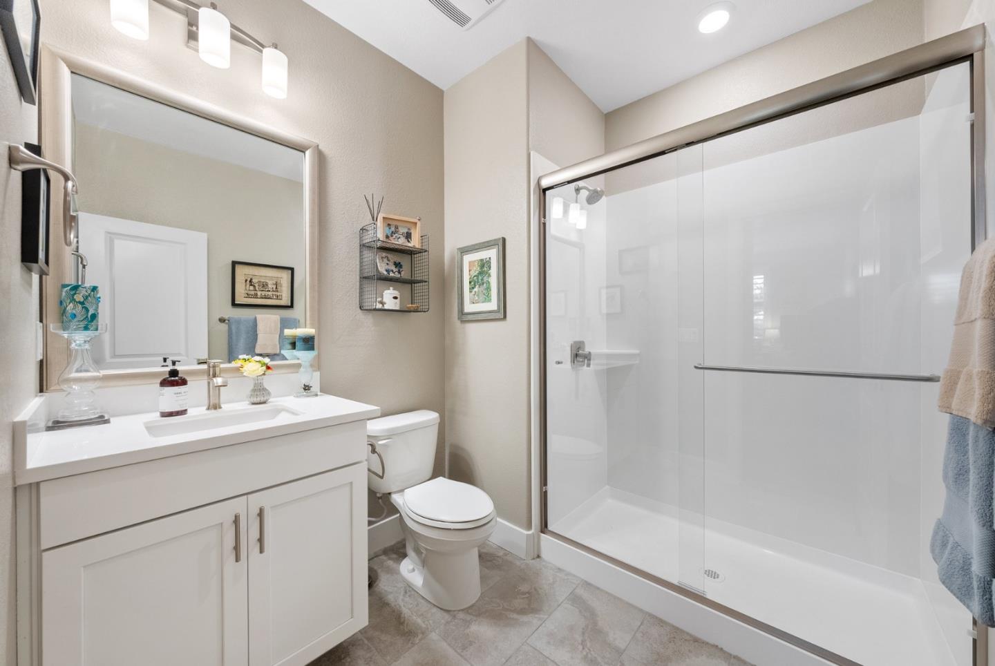 6725 Magnetic Loop San Jose, CA 95119 - Photo 10 of 68 a bathroom with a sink mirror toilet and shower