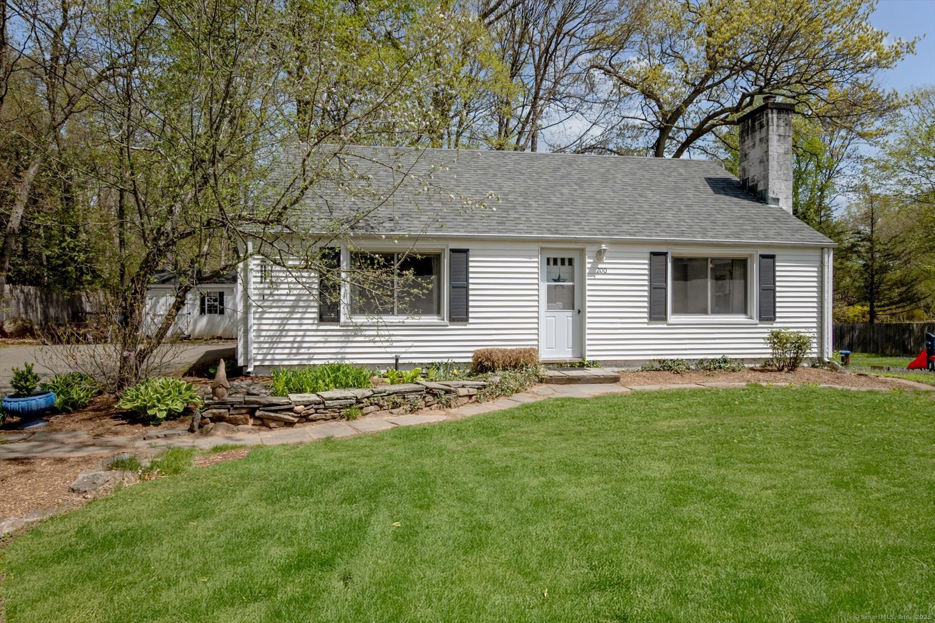 200 West Mountain Road Simsbury, CT 06092 - Photo 1 of 1 a view of front of a house with a yard