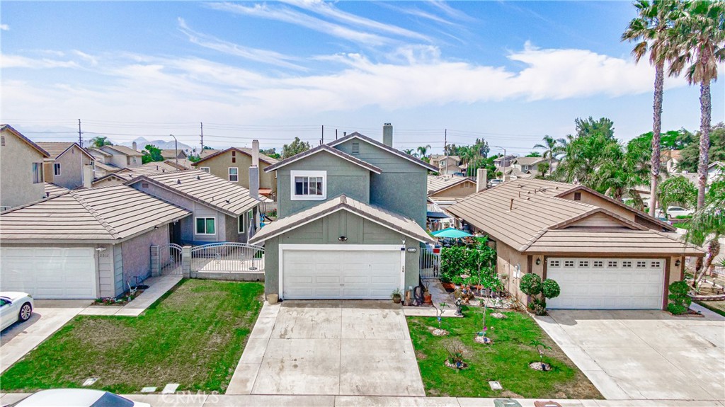 2016 Fig Tree Road Colton, CA 92324 - Photo 1 of 1 a view of house with garden and tall tress