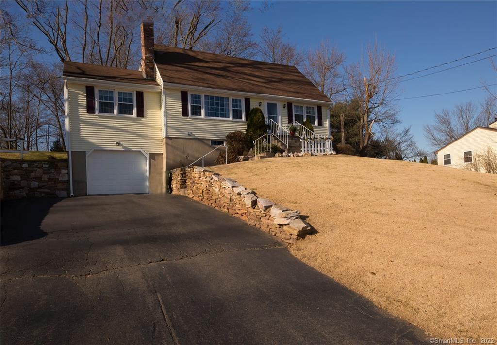 63 Hillside Road Cromwell, CT 06416 - Photo 1 of 1 a front view of house with yard
